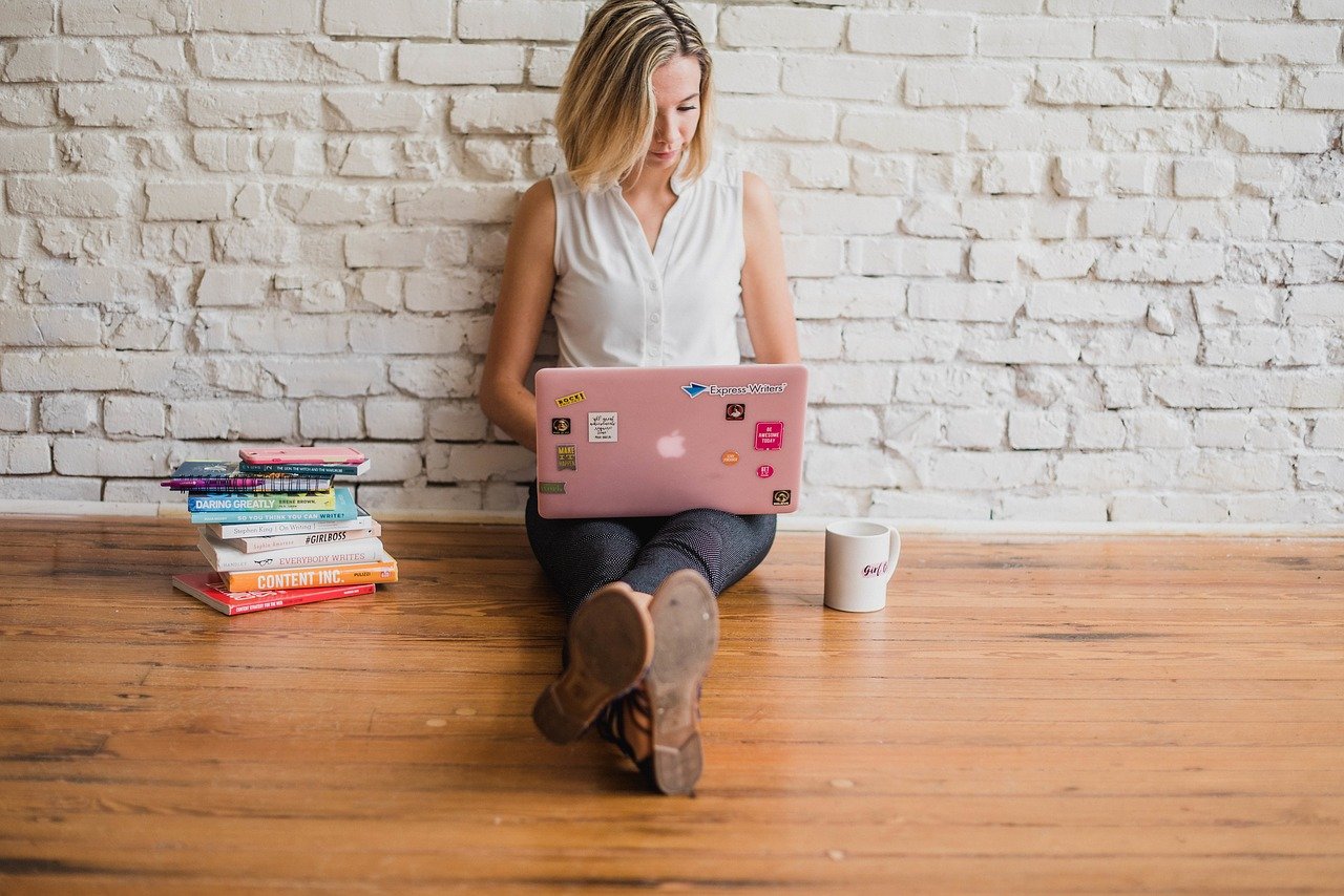 Woman typing on computer