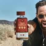 Bottle of Tres Comas held by Russ Hanneman, character on Silicon Valley